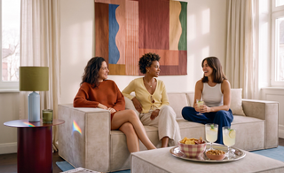 Woman relaxing on an M1 modular sofa