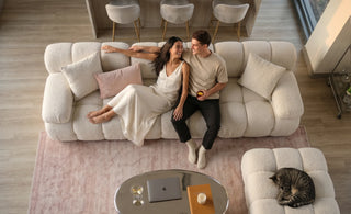 couple relaxing and laughing on marshbello sofa