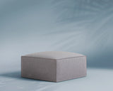 M1 Outdoor Ottoman Sofa Seat in Comet Mist, three-quarter view.