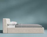 A queen-size bed frame in Helium Cloud, viewed from the side.