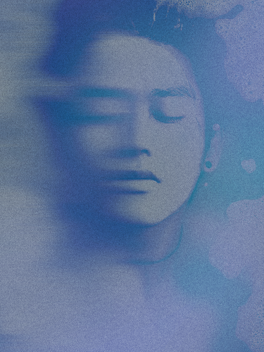 Abstract banner featuring a serene face with eyes closed, surrounded by soft blue and purple hues, evoking a calming and meditative atmosphere