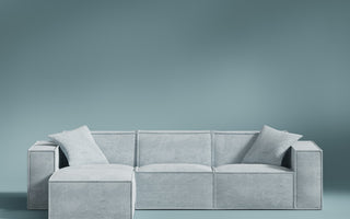 Comment Mettre un Jeté sur un Sofa de Coin