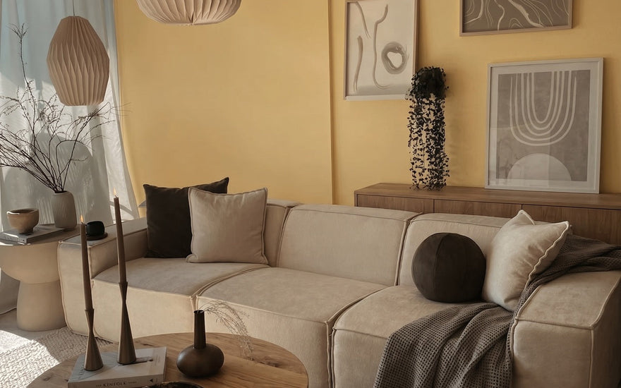 Modern M1 three seater modular sofa in a bright living room with yellow walls