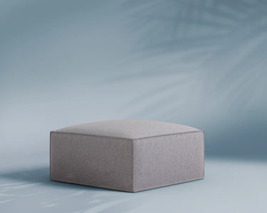 M1 Outdoor Ottoman Sofa Seat in Comet Mist, three-quarter view.