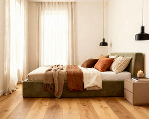 # Side view of O2 Soft Frame Bed in Krypton Green, featuring a modern minimalist design with a soft, foam-based structure and elegant, low-profile aesthetic.