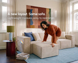 Woman rearranging a beige modular sofa by moving an ottoman. Text reads “A new layout. Same sofa. Lightweight modules, easy to rearrange.”