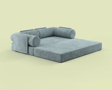 Side view of the S8+ sofa bed in Atmos Teal, shown in king-size bed mode.