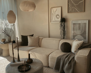 #color_inactive
A modern minimalist living room featuring a modular couch and clean design